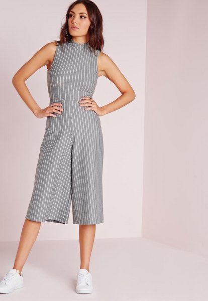 gray and white striped jumpsuit with a high neck