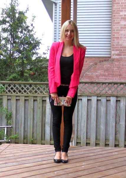 pink blazer with a completely black outfit
