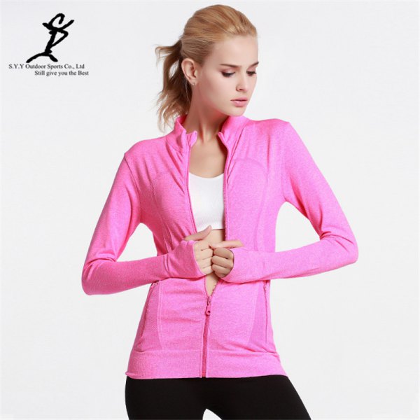 Pink jacket with a white sports bra top