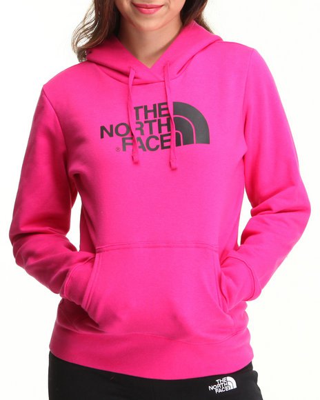 Pink-colored North Face pullover hoodie with black sport nylon pants