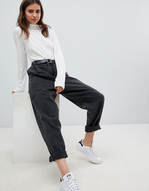 ASOS DESIGN tapered boyfriend jeans with curved seams and belt in .
