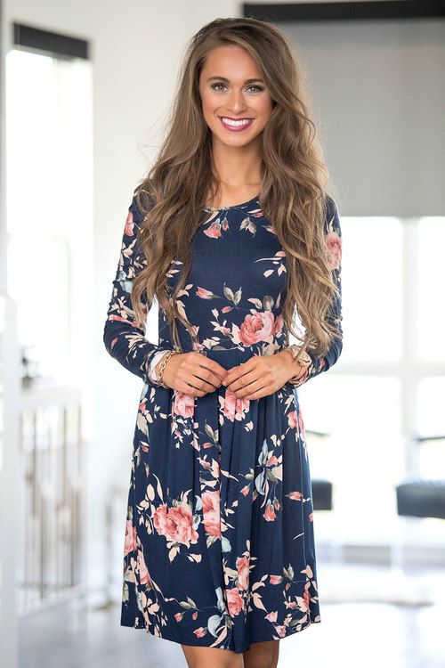This beautiful floral dress is so easy to love all season long! We .