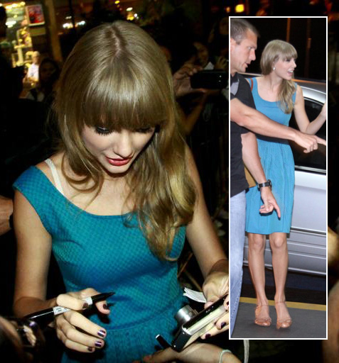 Taylor Swift's Turquoise check dress and brown sandals in Brazil .