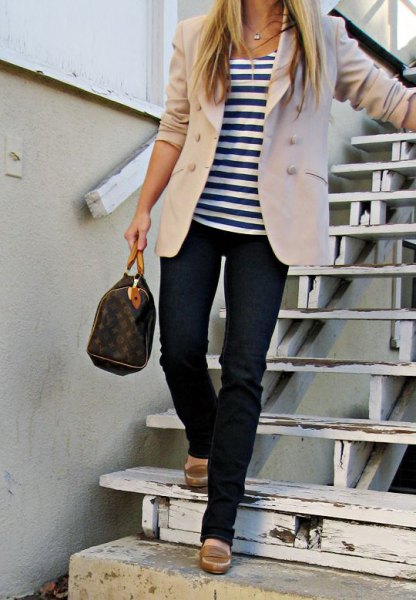 Ivory blazer with a striped t-shirt and dark blue jeans