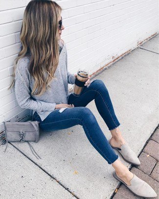 Knit sweater with dark blue skinny jeans and gray suede shoes