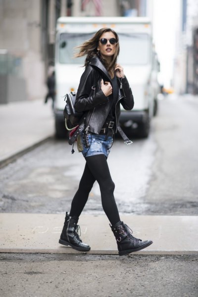 Leather jacket with minirim skirt and black leather boots