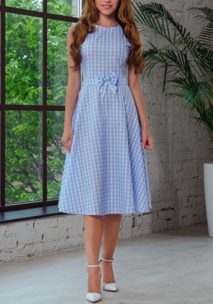 light blue and white midi flare dress with a plaid band and waist