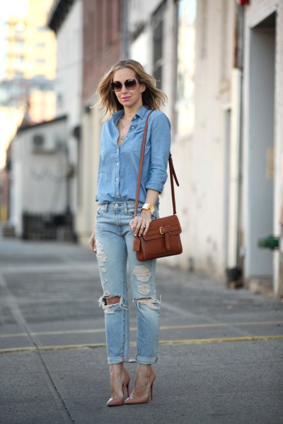 Light blue chambray shirt with buttons and ripped boyfriend jeans