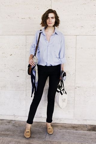 Light blue shirt with buttons, black skinny jeans and leather loafers