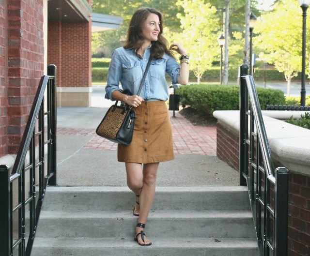 light blue chambray shirt with buttons, mini skirt and sandals