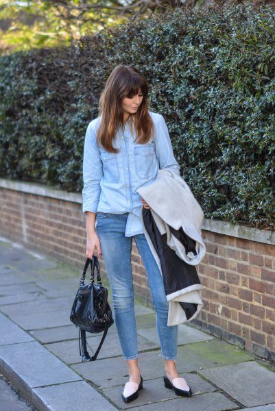 Light blue chambray shirt with short skinny jeans and black and white slippers