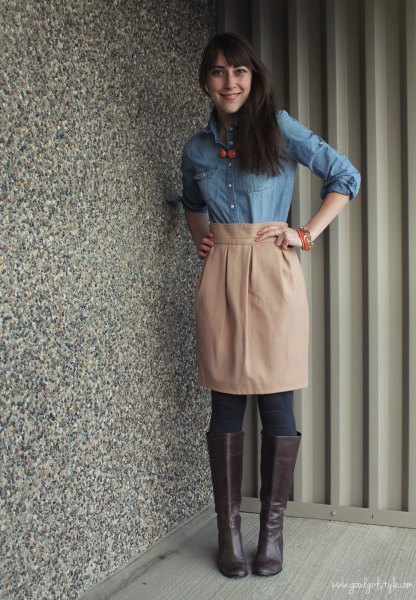 light blue chambray shirt with pink knee-length skirt with a high waist