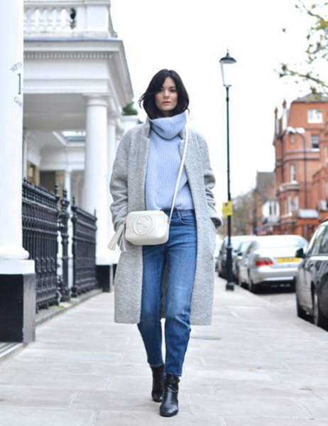 Light blue sweater with a cowl neckline, gray wool coat and jeans
