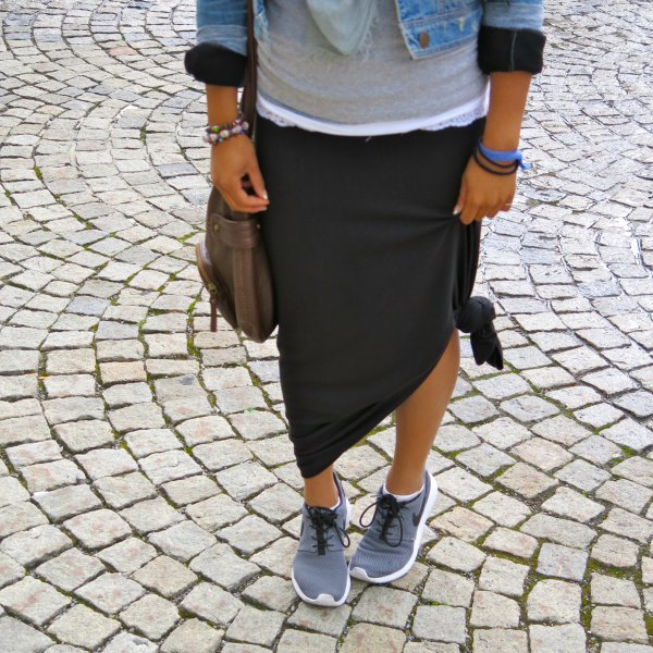 Light blue denim jacket with a black knotted maxi travel skirt