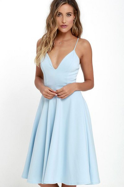 Light blue dress with deep V-neck and flared dress