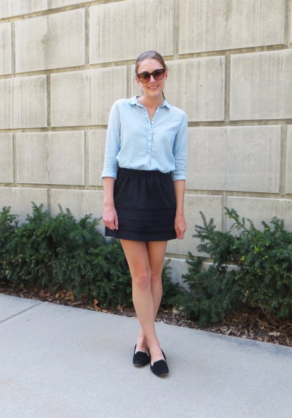 light blue half-sleeved blouse with black mini skirt