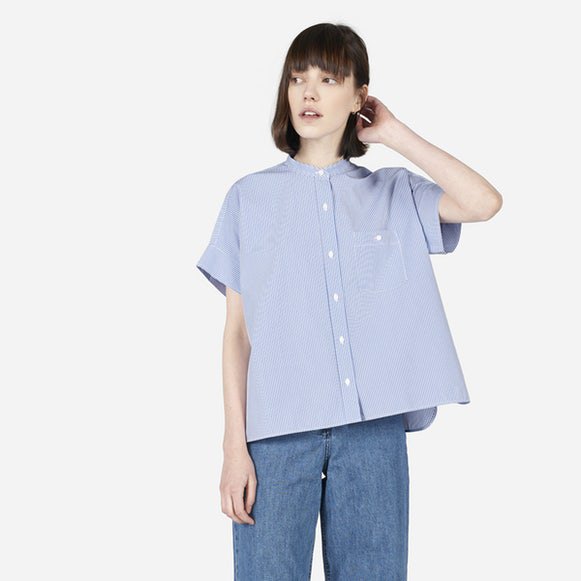 light blue oversized collarless short sleeve shirt