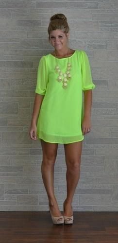 light green mini shift dress with half sleeves and pink heels