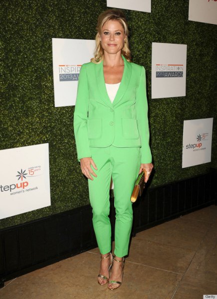 light green suit with white t-shirt with scoop neck and silver heels