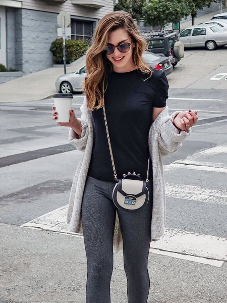 light gray longline cardigan with black t-shirt and knitted trousers