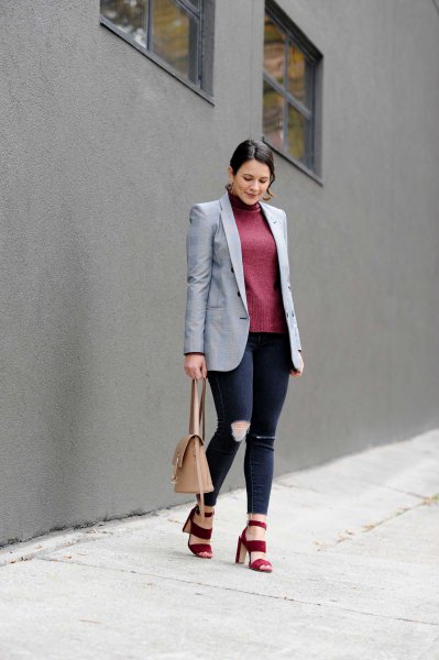 Light gray oversized blazer with a green sweater with a stand-up collar