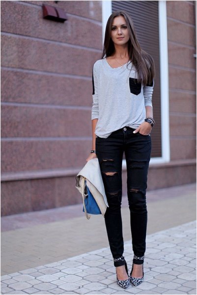 Light gray sweater with a scoop neckline, ripped jeans and leopard print heels