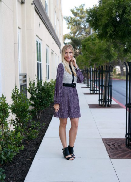 light gray vest with a long-sleeved mini dress and open toe boots