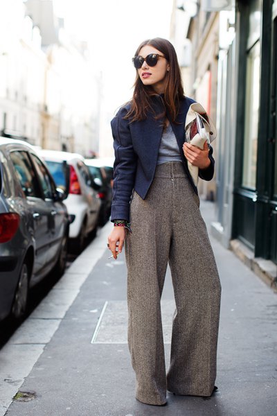 light gray tweed trousers with wide legs, black moto jacket