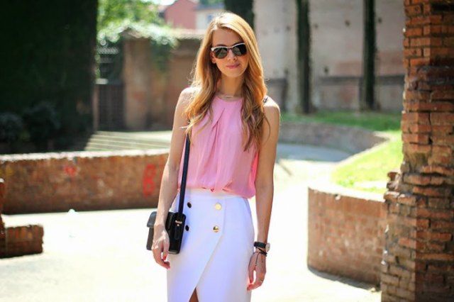 Light pink sleeveless chiffon blouse with white midi wrap skirt