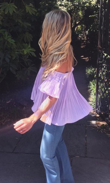 light purple off-shoulder pleated blouse with skinny jeans
