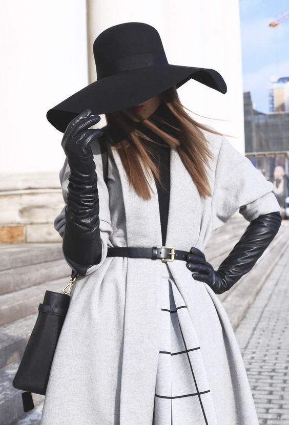 long gray coat with black gloves