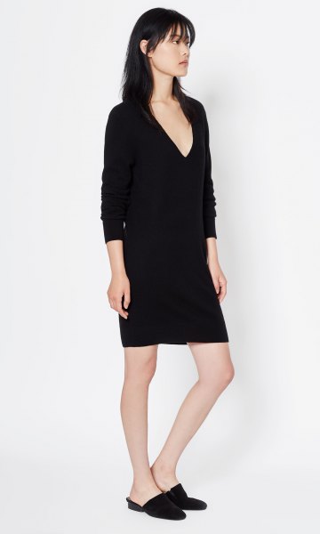 long-sleeved black cashmere mini dress with deep V-neckline
