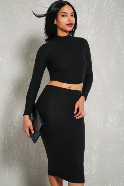 two-piece, figure-hugging long-sleeved dress with mock neck