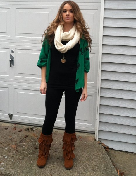 green cardigan with fringed boots in the middle of the calf