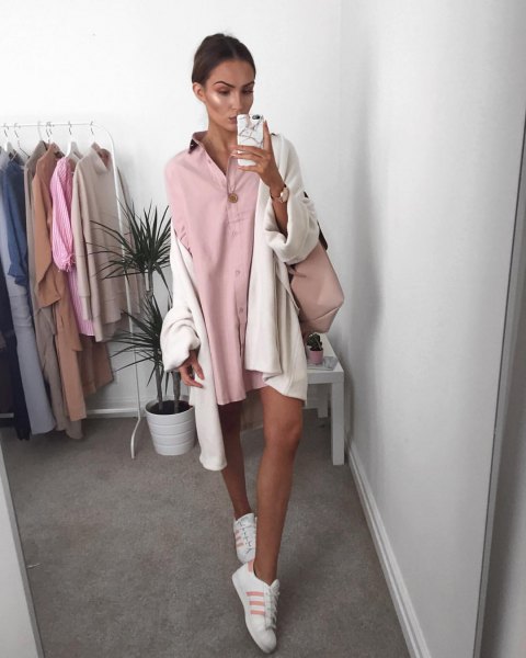 Mini shirt dress with pink buttons and white, oversized cardigan