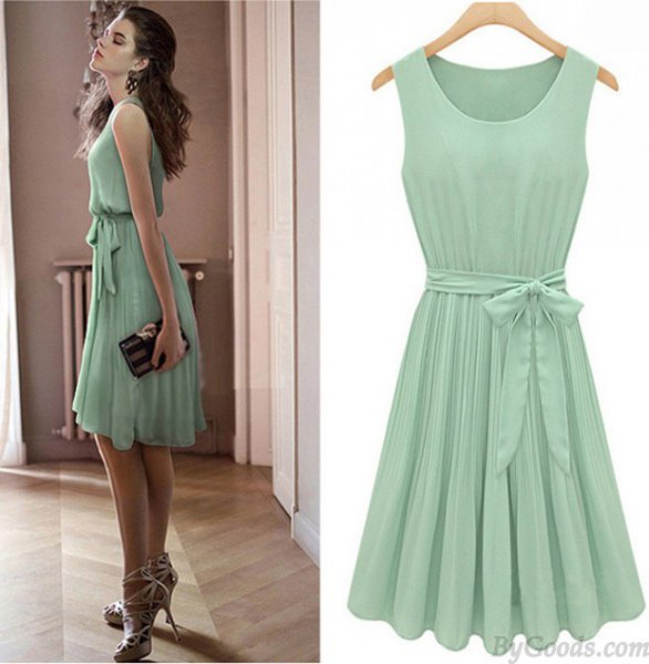 Mint green tie, knee-length, pleated skater dress with strappy heels