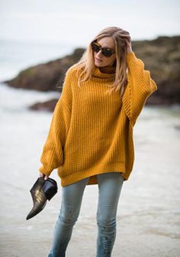Chunky ribbed sweater with mock neck and light gray slim fit jeans