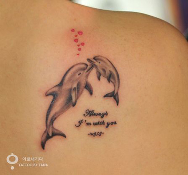 Mother daughter dolphin tattoo