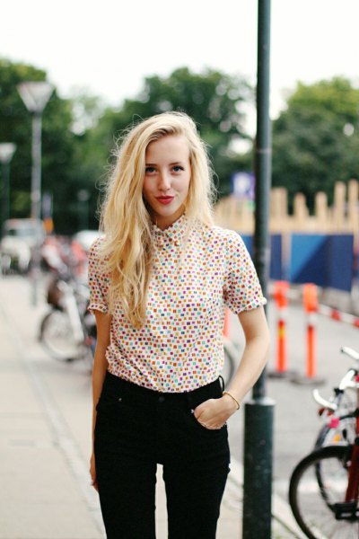 multicolored shirt with dotted buttons and black jeans