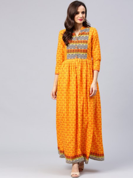Mustard maxi dress with three-quarter sleeves and tribal print