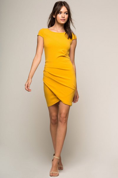 Bodycon wrap dress with mustard yellow sleeves