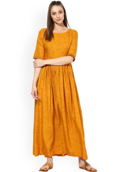Mustard yellow, half-sleeved, pleated maxi dress with a relaxed fit