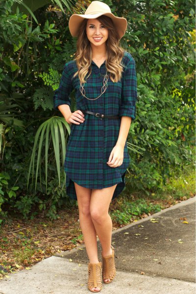 Dark blue and green checked tunic with belt and straw hat