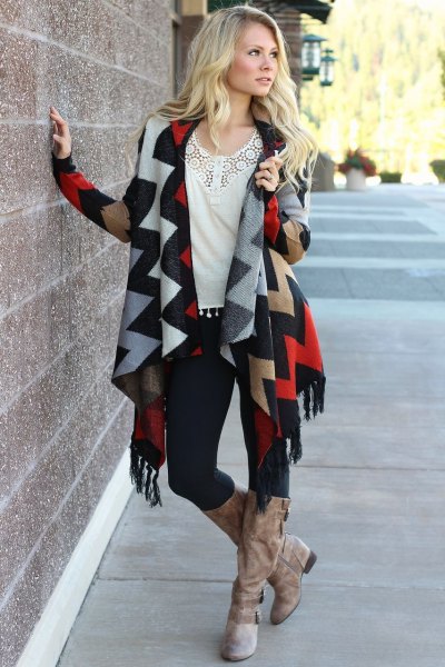 dark blue and orange cardigan with zigzag print and long boots