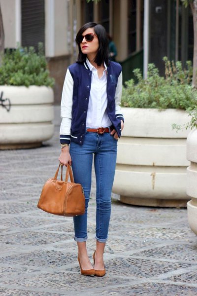 Dark blue and white bomber baseball jacket with a white buttoned shirt