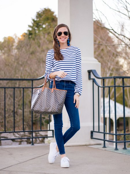 dark blue and white striped long-sleeved T-shirt with skinny jeans