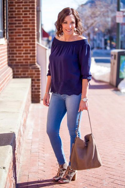 Dark blue top with a boat neckline and light pink sandals
