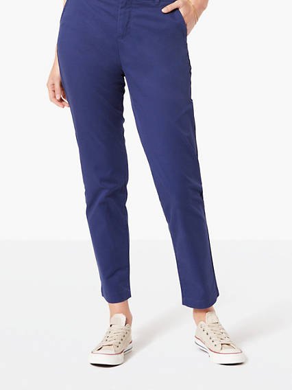 Dark blue, short cut chinos with a white blouse
