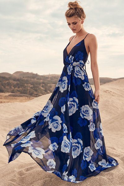 Dark blue, deep summer dress with a deep V-neckline and floral print