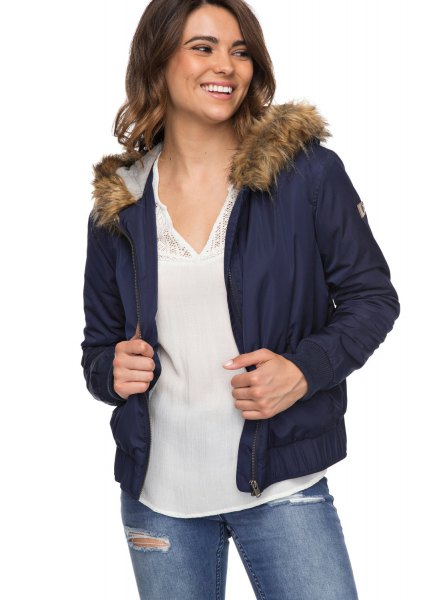 Dark blue bomber jacket with hood made of faux fur and chiffon blouse